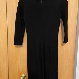 Black spandex, three-quarter length sleeve tea length dress